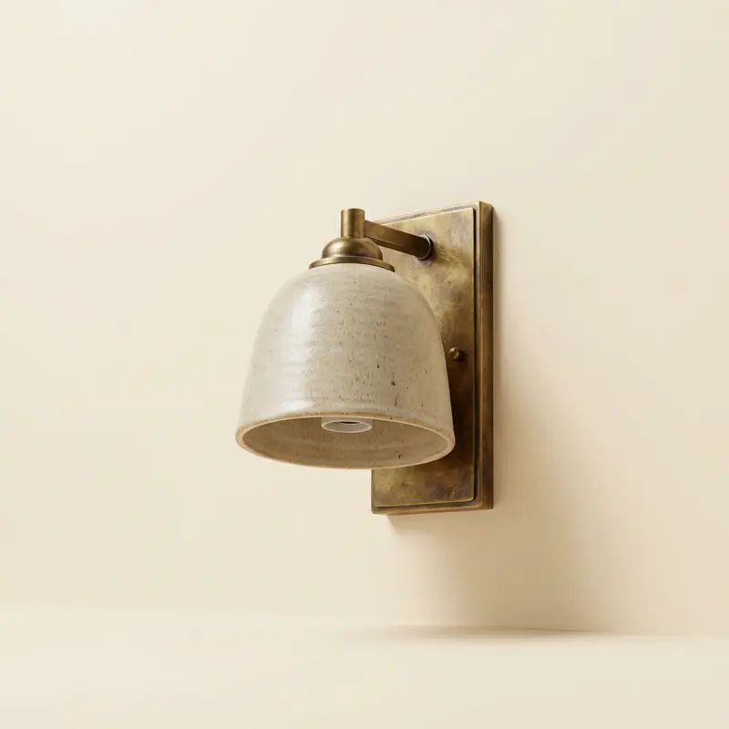 Oriel stoneware wall sconce in Oat glaze